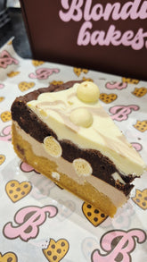 Kinder, milkybar & white malteeser cookie pie slice